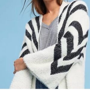 sleeping on snow Anthropologie sweater